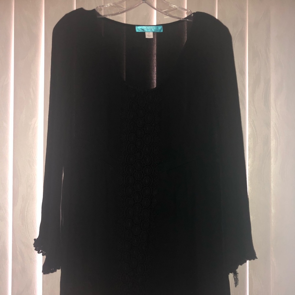 Black Francesca’s long sleeve flowy dress.